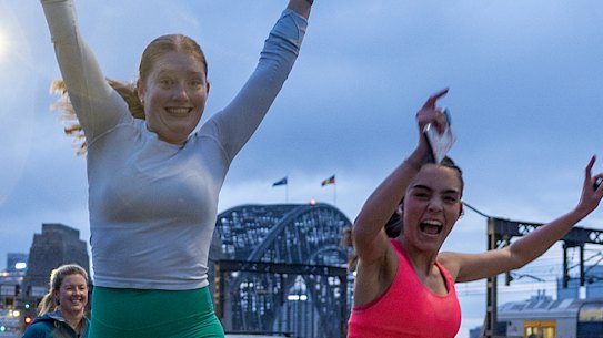 Members of the early morning run club undertake their exercise from Milson’s Point around the Opera House and back, Friday, 1 August 2025 in Sydney, Australia. There is a rise of fun-run clubs participating in the Sun Herald marathon next week.  Photo: Sam Mooy / The Sydney Morning Herald