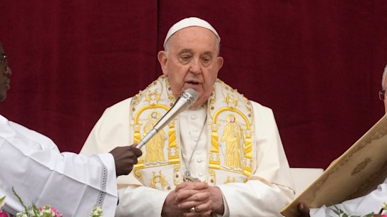 Pope Francis bestows the “Urbi et Orbi” (To the city and to the world) blessing from the central lodge of the St Peter’s Basilica at the Vatican on Sunday.