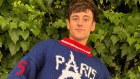 Tom daley in his hand-knitted Olympic sweater