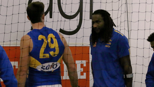 Nic Naitanui will need a knee reconstruction, leaving the main ruck duties to Scott Lycett (left) as the Eagles head towards another finals tilt.