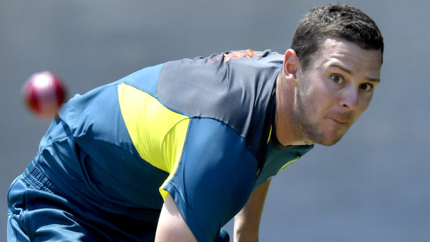 Up for the challenge: Australian paceman Josh Hazlewood fires one down at training on Monday.