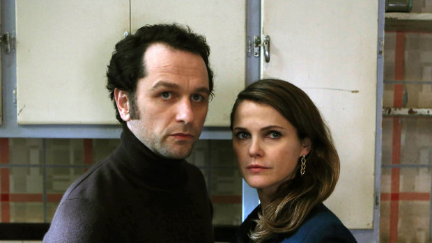 Matthew Rhys, left, and Keri Russell appear in a scene from "The Americans", the show inspired by the Russian spy family.