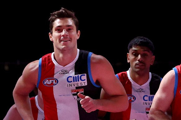 Jack Steele leading out the Saints last year with Nasiah Wanganeen-Milera at his shoulder.