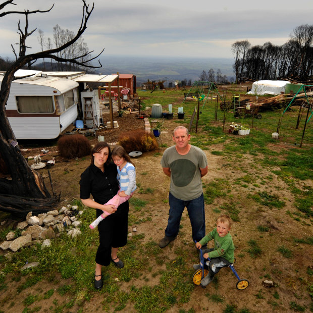 Shane and Bron Sparkes, with Lola and Dom, lived in a caravan on their property after the Black Saturday fires.