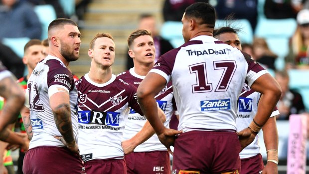 Daly Cherry-Evans (centre) in anguish following a second last-gasp loss at ANZ Stadium in three days.