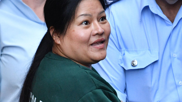 Dung Thi Ngo is escorted from court on Monday. 