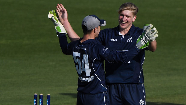 Will Sutherland claims a wicket against Tasmania on Monday.