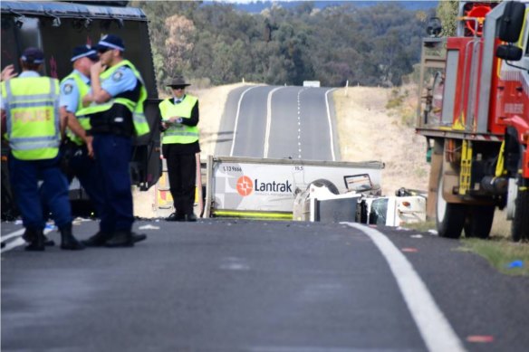 One man is dead after a crash between a truck and a bus on the Newell Highway. 