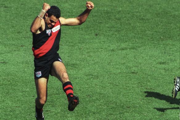 Michael Long leaps for joy after his defining goal in Essendon's 1993 premiership.