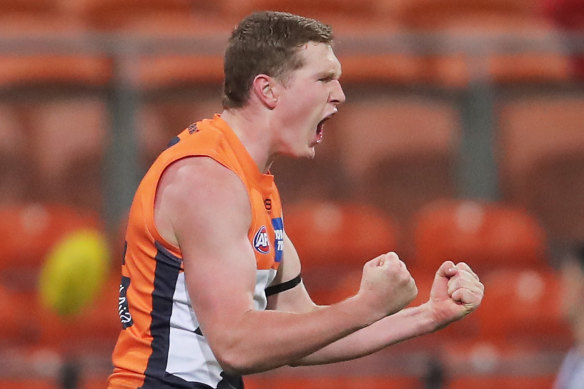 Tom Green celebrates a goal during the Giants' two-point win over Collingwood.