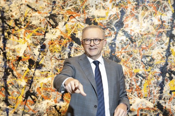 Prime Minister Anthony Albanese in front of <i>Blue poles</i>, at the National Gallery of Australia in April.