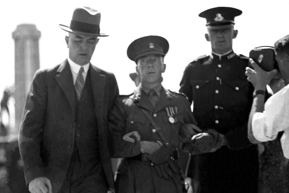 The arrest of Francis De Groot, a member of the fascist New Guard, after he upstaged NSW premier Jack Lang at the opening of the Sydney Harbour Bridge in March, 1932.