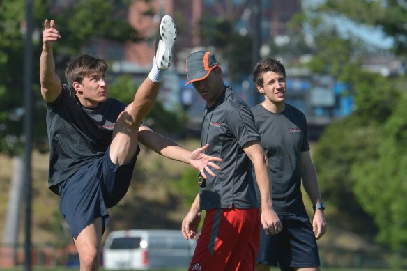 Nathan Chapman (in red shorts) runs a Prokick Australia academy session in 2014. 