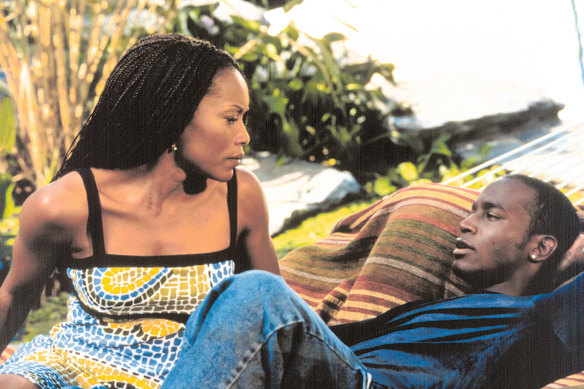 Angela Bassett and Taye Diggs in the problematic 1998 film <i>How Stella Got Her Groove Back</i>.