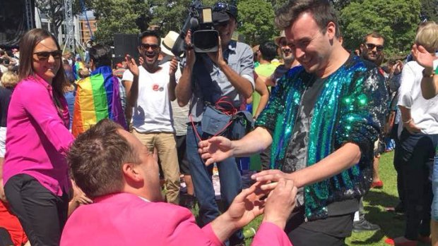 James 'Breko' Brechney proposes to his partner Stuart Henshall after the SSM postal survey result announcement in Sydney's Prince Alfred Park.