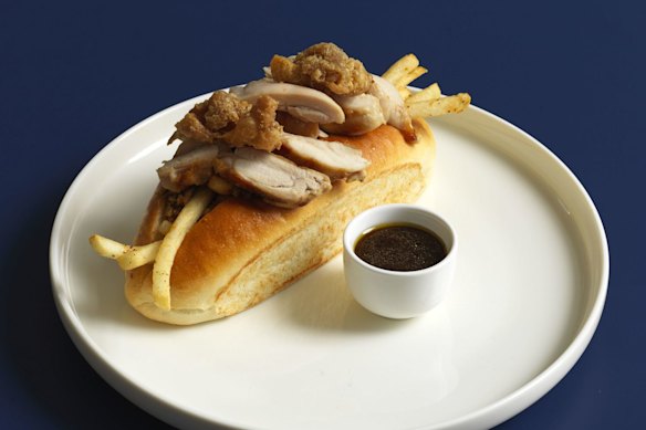 The roast chicken roll with house-made stuffing and fried chicken skin.
