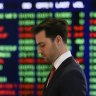 ASX firms on mixed day of earnings