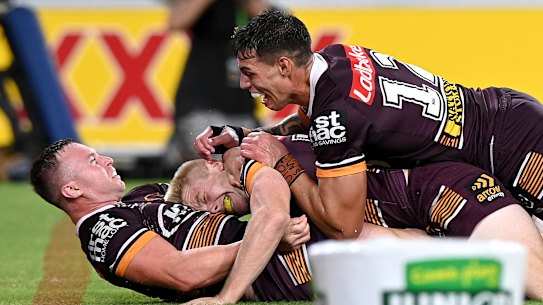 Jake Turpin, Tom Dearden and Jordan Riki celebrate another try.