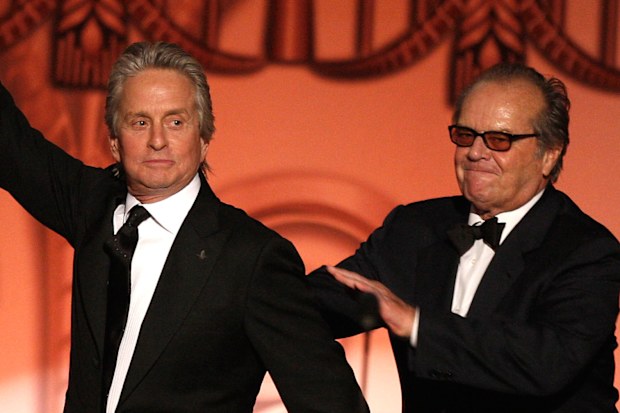 Actor Jack Nicholson (R) presents actor Michael Douglas the Life Achievement In Motion Pictures and Television award during the AFI Life Achievement Award: A Tribute to Michael Douglas at Sony Pictures Studios on June 11, 2009 in Culver City, California.