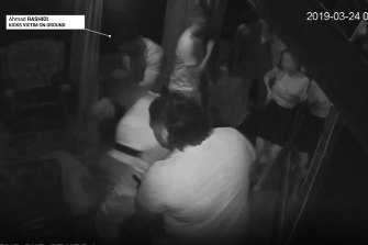 Ahmad Rashidi, a younger brother of Finks bikie gang leader Kosh Radford, is seen kicking a man in a screenshot from a video of the incident that took place at a Melbourne strip club in March 2019.