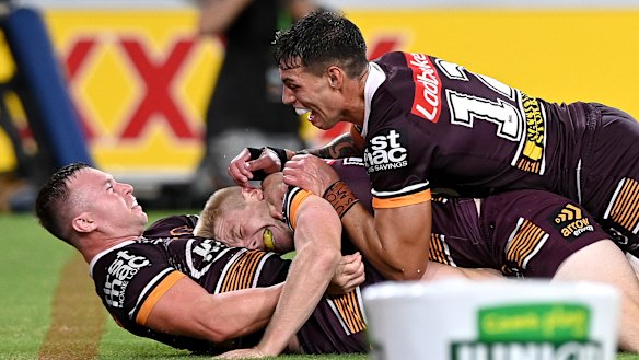 Jake Turpin, Tom Dearden and Jordan Riki celebrate another try.