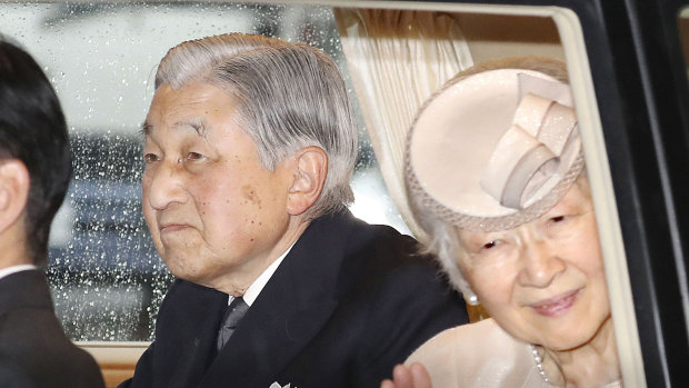 Emperor Akihito and Empress Michiko on their way to visiting Ise Grand Shrine.