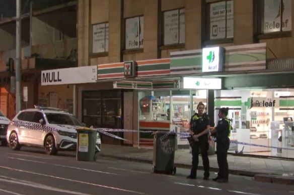 Police at the scene on Acland Street in St Kilda, where a British tourist was stabbed.