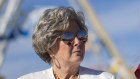 Susie Wiles watches her boss on stage at a campaign rally in Wildwood, New Jersey.