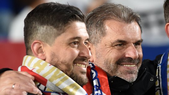 Arthur Papas celebrates Yokohama F. Marinos' title win last season with Ange Postecoglou and Peter Cklamovski, who now coaches Japanese rivals Shimizu S-Pulse.