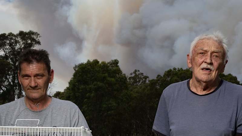 ‘I didn’t get a wink of sleep’: Fire-hit towns left to watch and hope