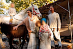 Catherine Birmingham and Nathan Trevallion live off-the-grid with their three young children in the woods in Southern Italy.