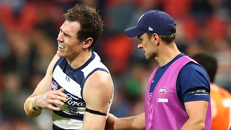 Geelong AFL crisis deepens as star forward Jeremy Cameron is hospitalised with an injury