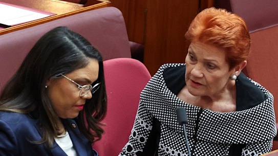 Jacinta Nampijinpa Price and Pauline Hanson chat in the Senate last week.