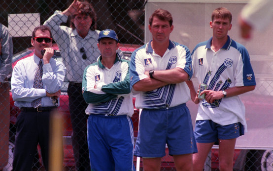 Hohns (far left) watches a 1996 net session with then captain Mark Taylor, coach Geoff Marsh, and Glenn McGrath.