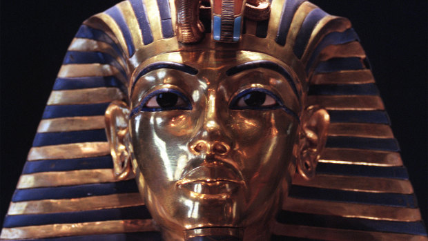 The gold funerary mask of the pharaoh Tutankhamun.