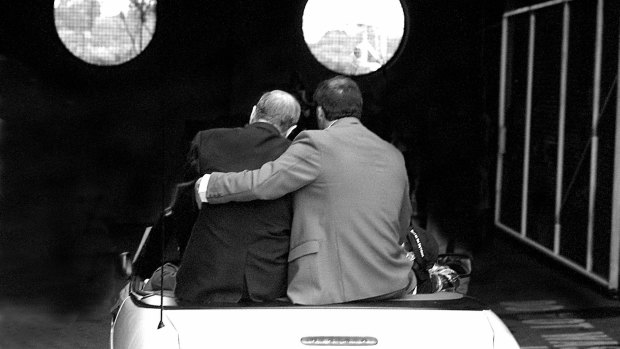 Hero’s farewell: E. J. Whitten, supported by his son Ted junior, leaves the MCG after a special tribute to him in June 1995.