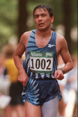 One of the competitors in the marathon in Atlanta in 1996. The race began at 7am local time and temperatures reached 33 degrees.