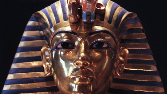 The gold funerary mask of the pharaoh Tutankhamun.