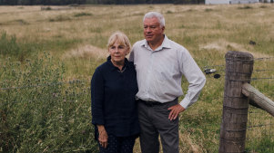 Bev and Graham Hordern at home in Moss Vale. Over their shoulder is the site of what may become the nation’s largest plastic recycling facility.