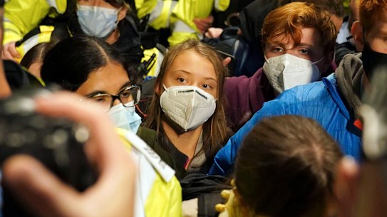 Greta Thunberg is mobbed after arriving in Glasgow for the COP26 summit.