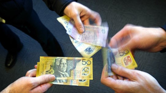 Half the Australian businesses that got a tax cut have banked the cash