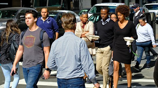 The US economy is showing signs of recovery but risks being battered again if a  stimulus deal is not reached.