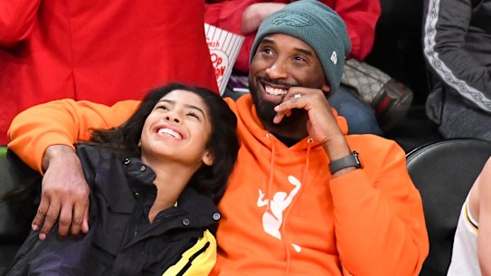 Kobe Bryant and daughter Gianna at a basketball game between the Los Angeles Lakers and the Dallas Mavericks at the Staples Center on December 29.