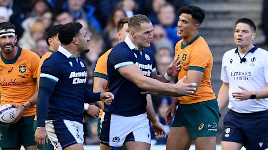 “I’ll see you next time”: Joseph-Aukuso Suaalii and Sione Tuipulotu trade words at Murrayfield.
