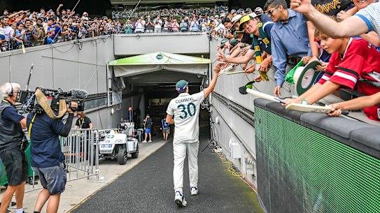 Pat Cummins thanks fans as he leaves the MCG after day five of the Boxing Day Test.
