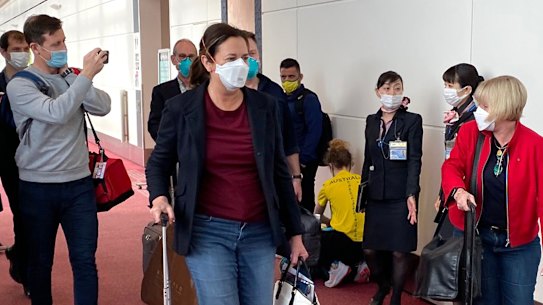 Queensland Premier Annastacia arrives at Haneda Airport ahead of a final pitch for the 2032 Olympics.