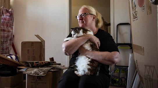 Megan Masters and cat Juno were happy to find a new home in better repair, but she says most homes that would be considered affordable were substandard. 