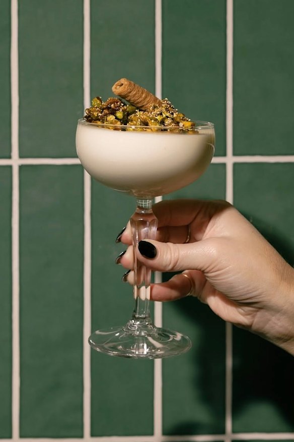 Panna cotta with honey pistachios and orange crumb.