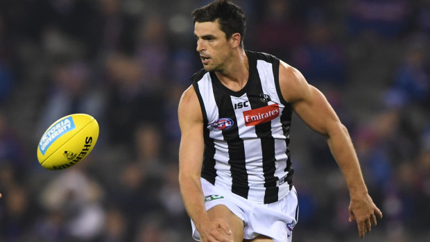 Comic relief: Scott Pendlebury helped lighten the mood as the Pies struggled to deal with a tenacious Bulldogs side.