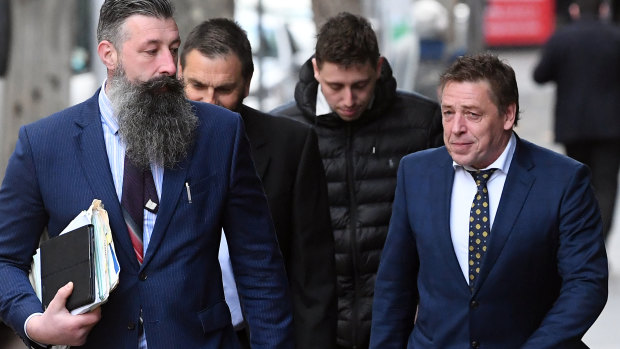 Mark "Bomber" Thompson (right) arrives at court on Thursday.